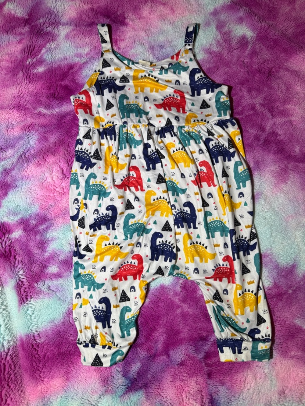 Trendy boutique White Romper with Red, Yellow, Teal, and Navy Dinosaur Print